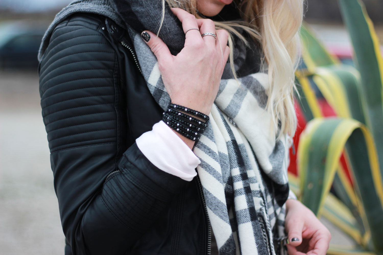 Leather jacket and blanket scarf