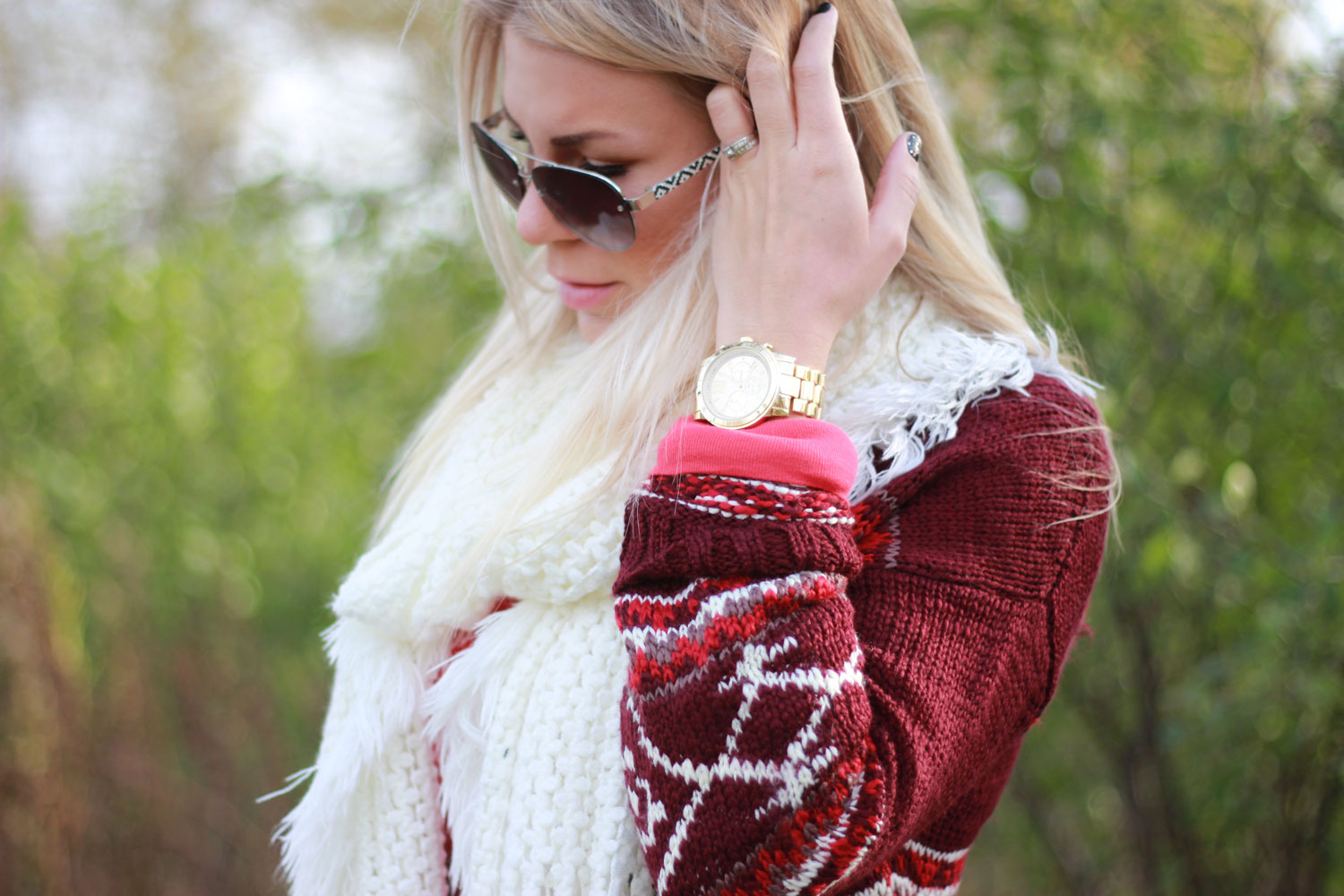 red cardi and fluffy boots