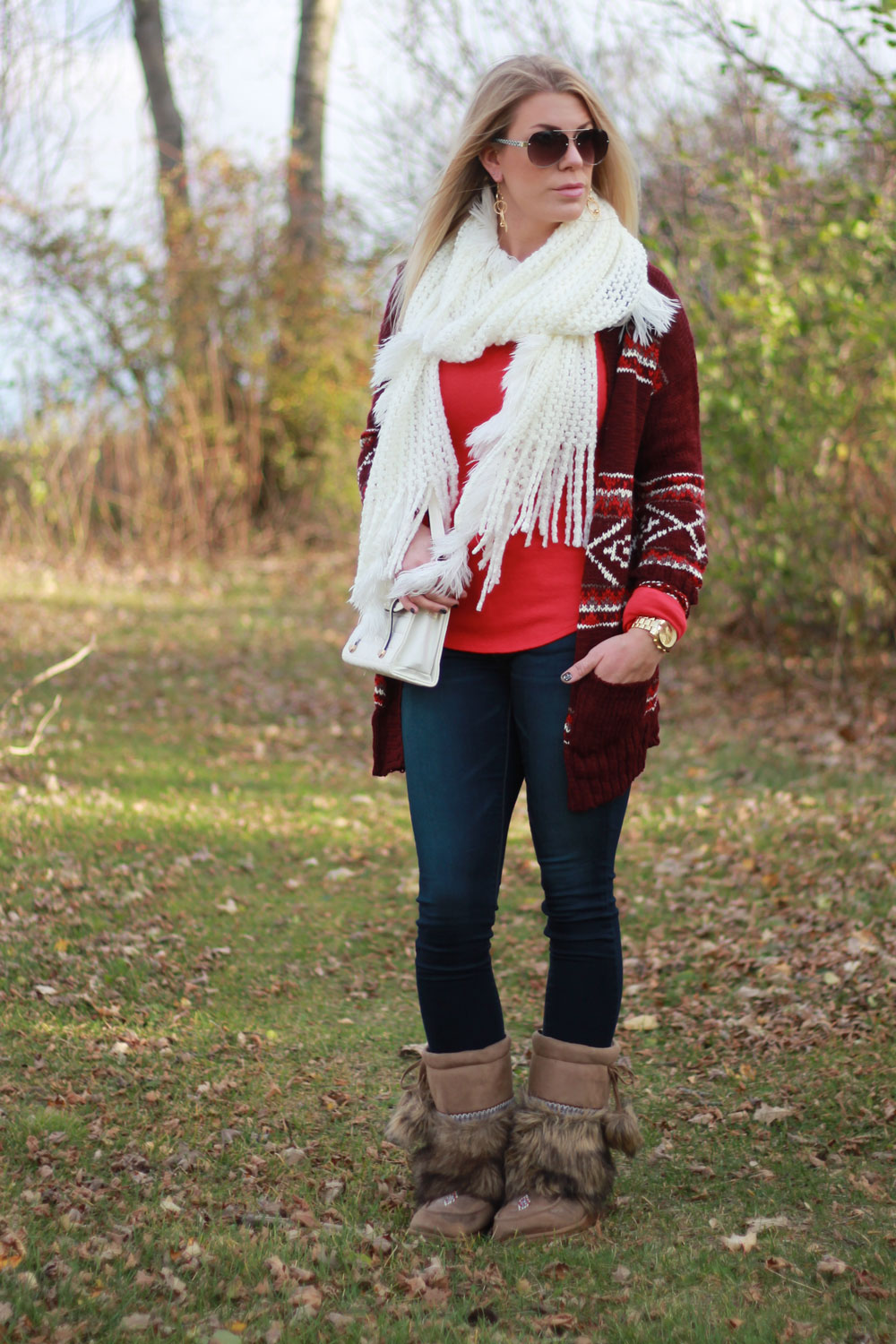 red cardi and fluffy boots