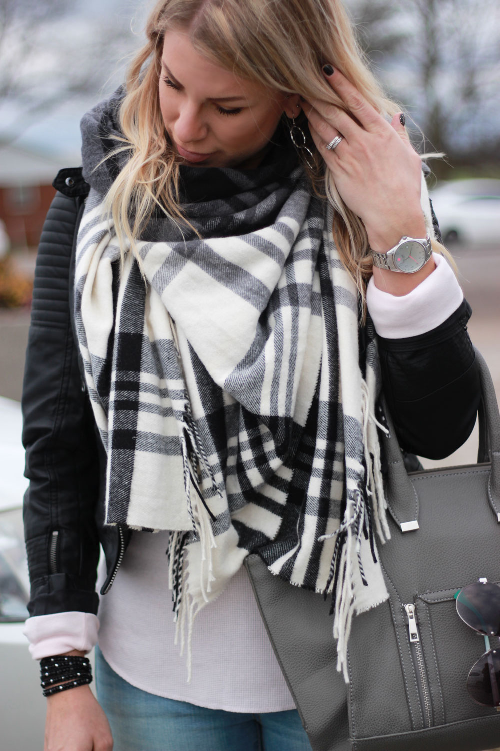 Leather jacket and blanket scarf